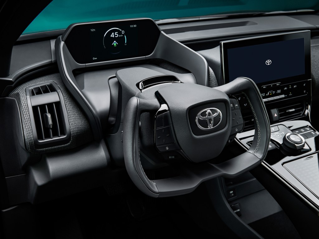 Toyota bZ4X yoke steering wheel, the base LE model is more affordable than other EVs.