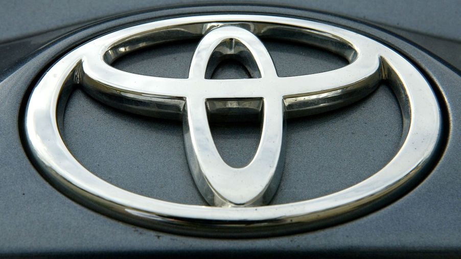 Toyota logo on a black background as found on a Toyota Land Cruiser.