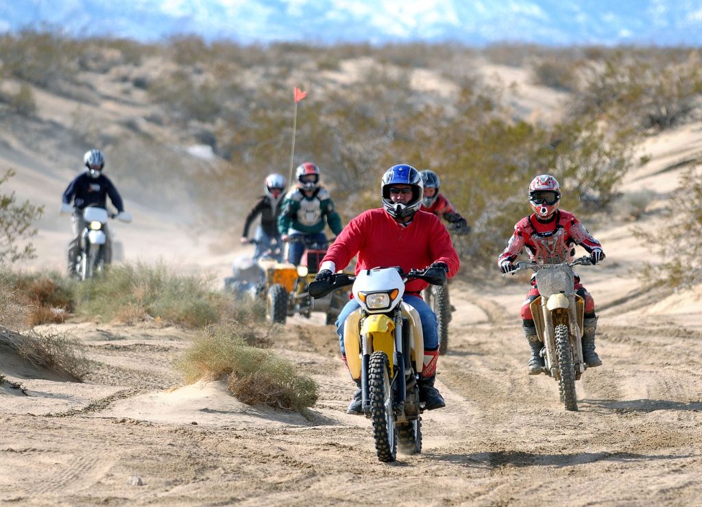 Trail dirt bike riders at the Boone Road/Johnson Valley OHV area in California