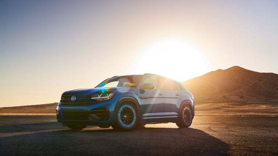 The Volkswagen Atlas Cross Sport GT concept in blue shadowed by a sunset
