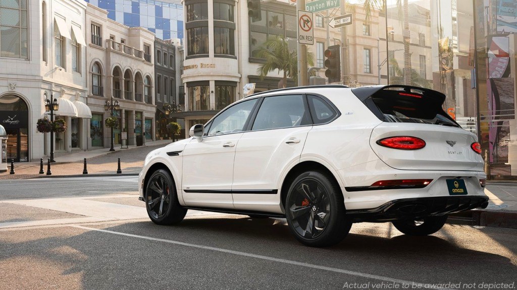 White 2021 Bentley Bentayga parked on a city street