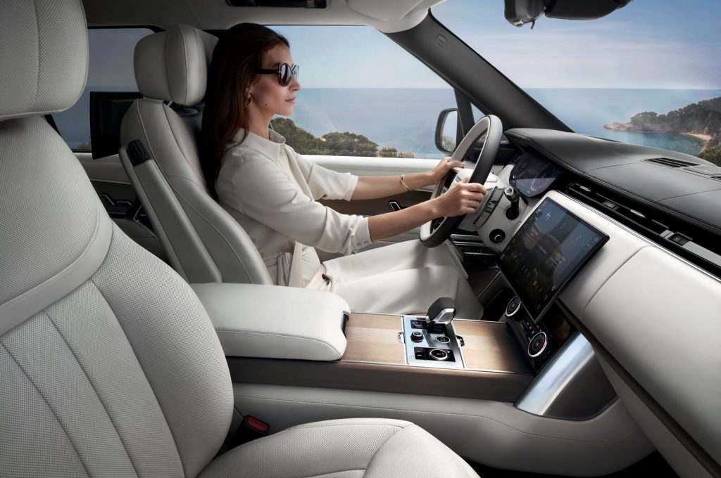 Woman driving a 2022 Land Rover Range Rover