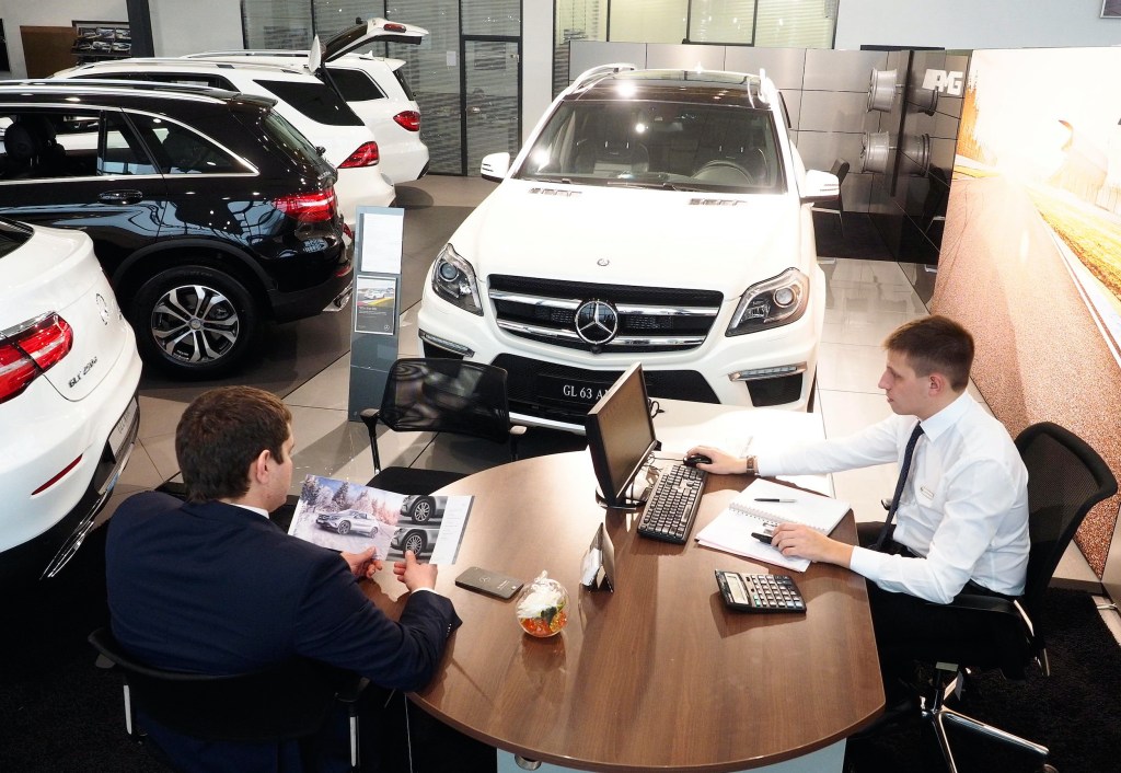 An employee at a Mercedes-Benz car dealership.