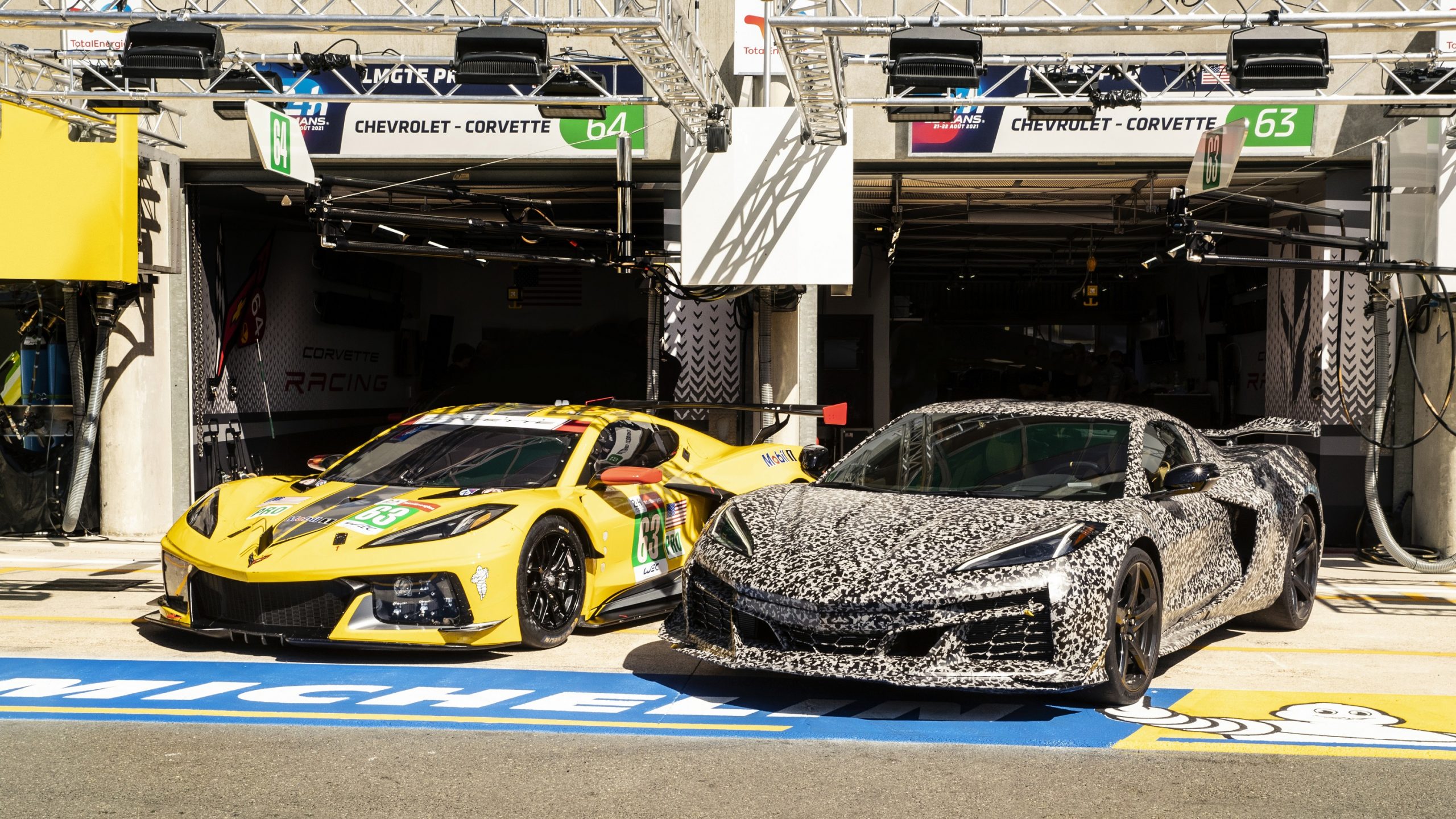The camo livery Z06 next to the C8.R race car at Le Mans