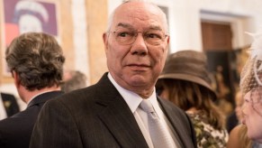 Colin Powell at a wedding reception