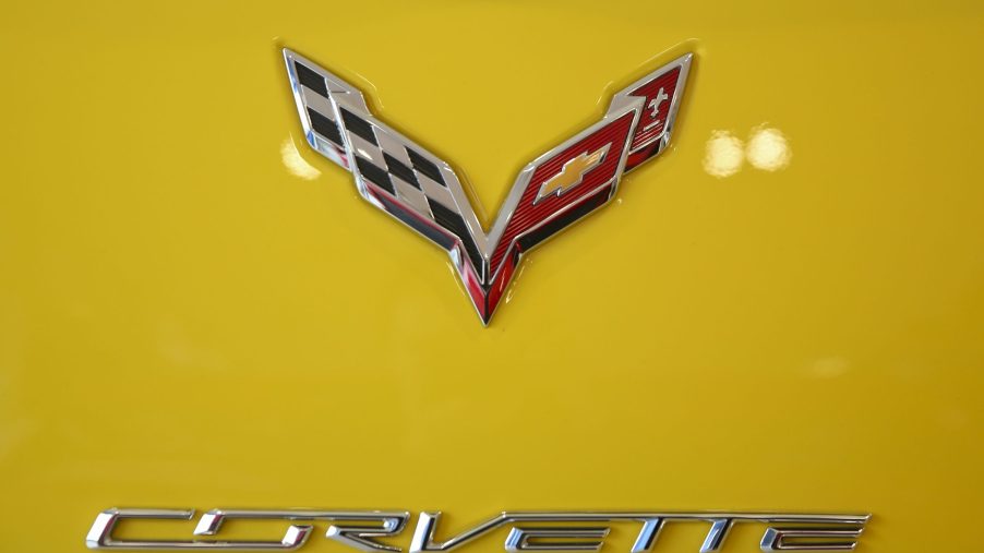 The Corvette badge on a yellow Chevrolet Corvette