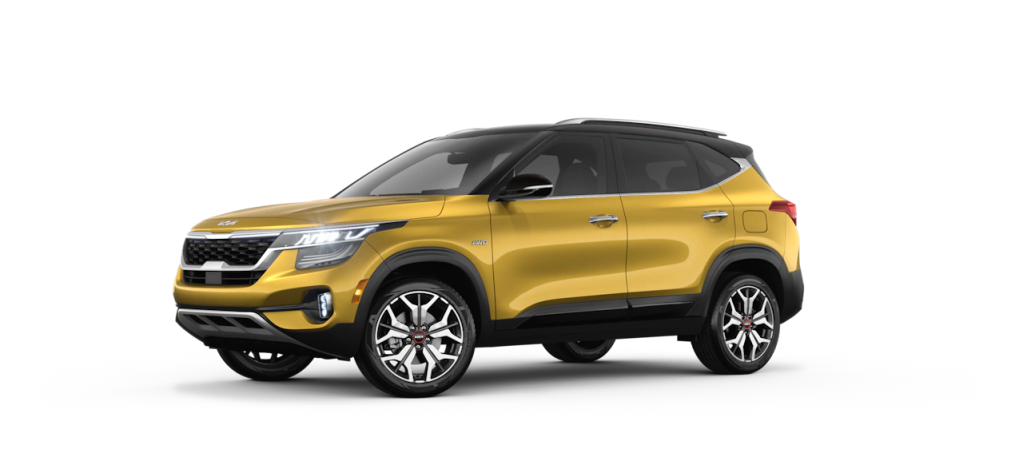 A yellow 2022 Kia Seltos against a white background. It's one of the best SUV deals of November 2021.