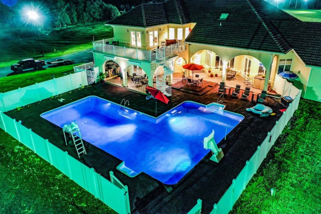 a photo the Little Talledega Airbnb and its huge swimming pool