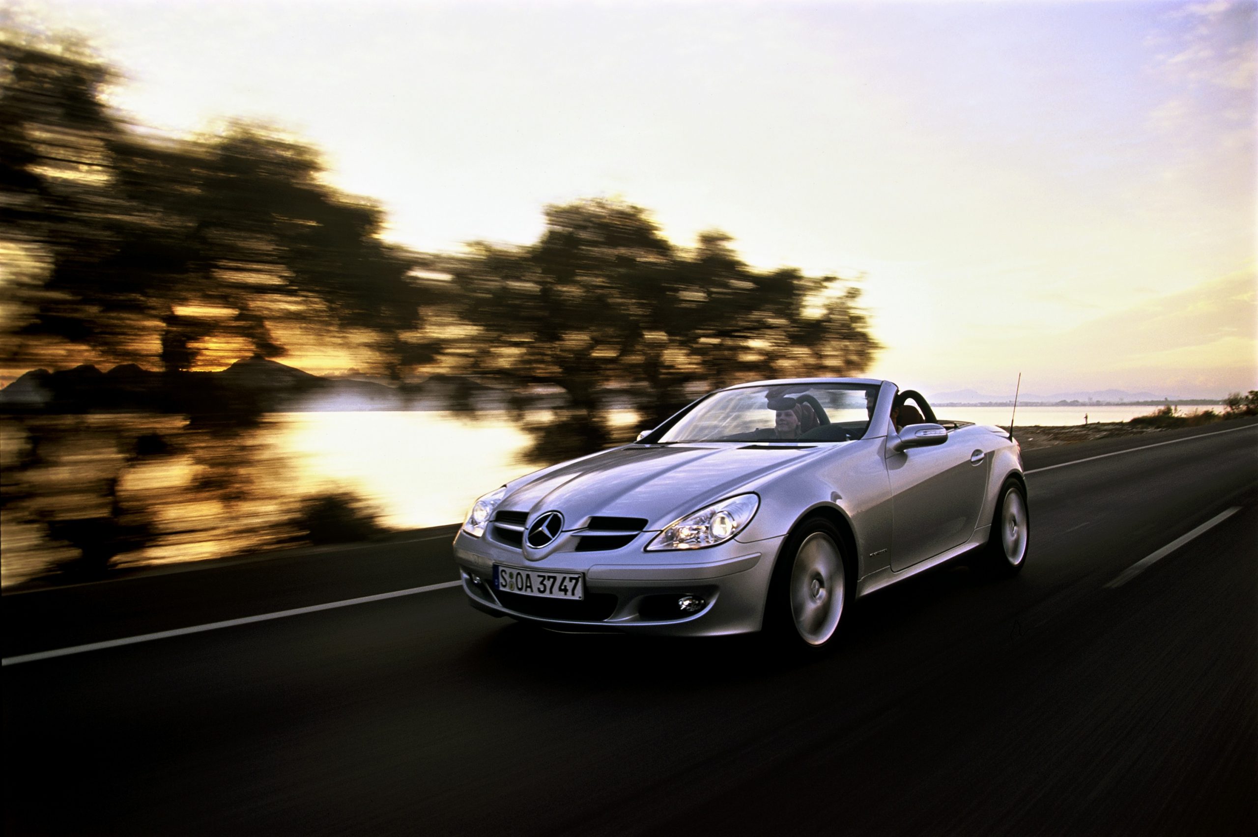 A silver Mercedes-Benz SLK55 shot from the front 3/4