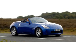 2005 Nissan 350Z driving down the road