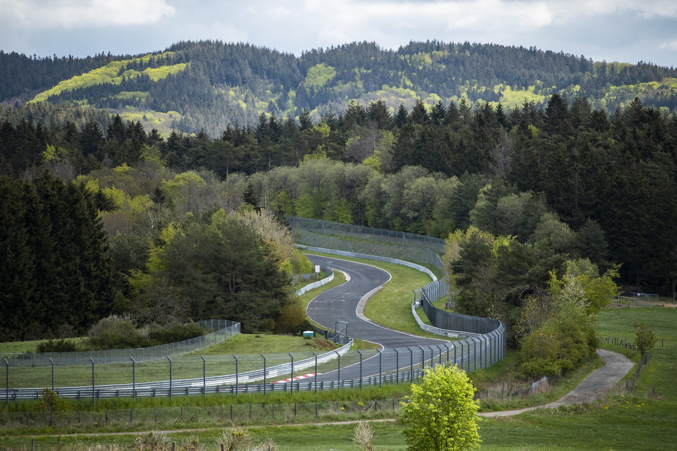 A panoramic shot of the Nurburgring Nordschleife in Germany on a clear day
