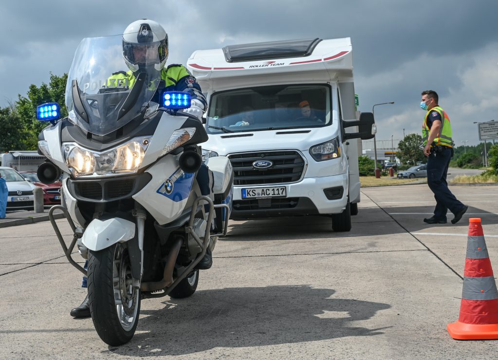 During a police check on motorhomes and caravans, a motorhome is checked by the police
