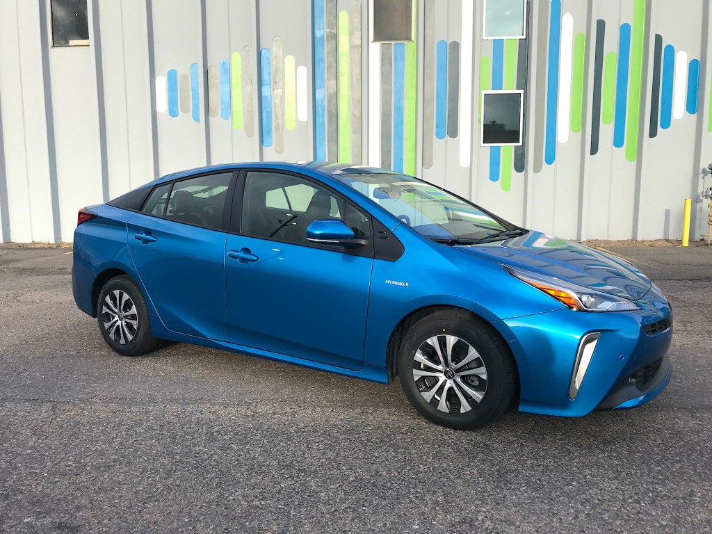 2021 Toyota Prius AWD front shot in front of a colorful wall