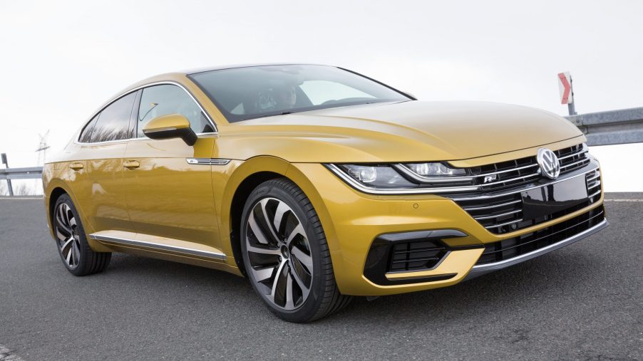 A yellow Volkswagen Arteon R shot from an angle