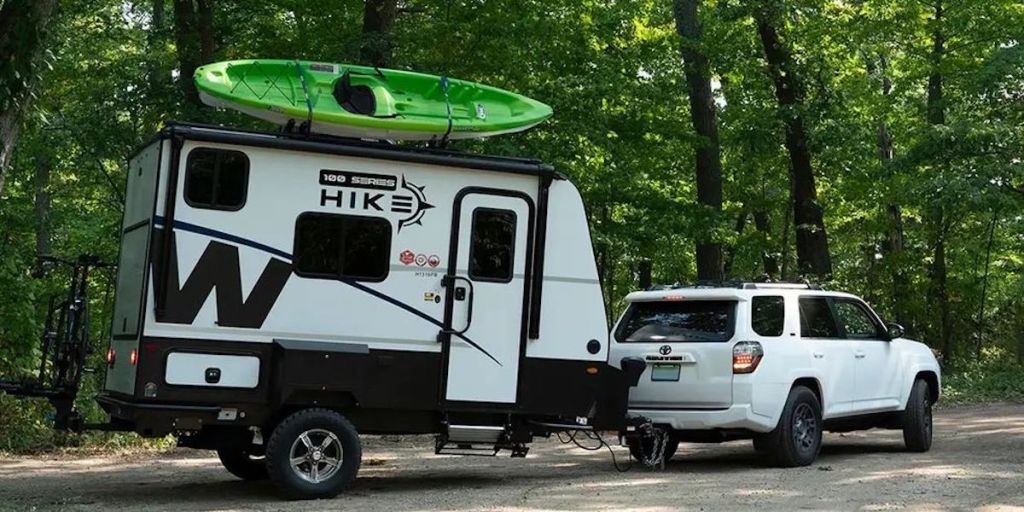 The Winnebago Hike 100 being towed behind a 4Runner shows that it is one of the best small campers to tow behind small trucks and SUVs