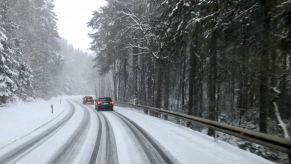 A winter forest road covered in snow in Saxony, Rodewisch