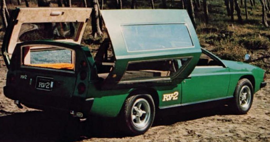 The rear 3/4 view of the green 1972 Toyota RV-2 concept with its rear panels open