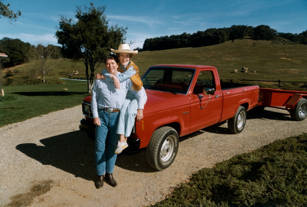 Ronald and Nancy Reagan stand next to their 1995 Ford Ranger