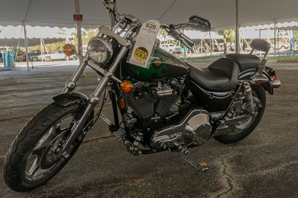 A black-and-green 1999 Harley-Davidson FXR3 at the 2021 Chicago Mecum auction