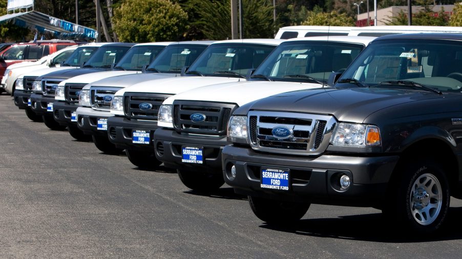 a dealer's lot loaded with 2011 Ford Ranger models, the last generation before its discontinuation.