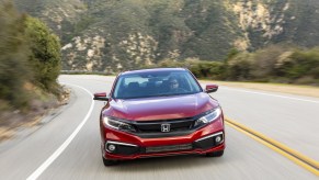 Honda Civic Touring driving on the road