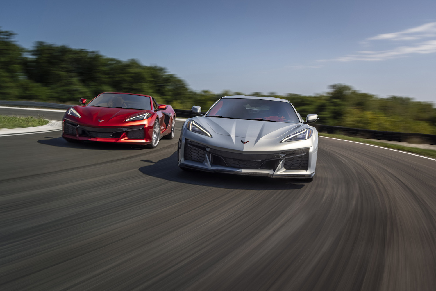 These are two 2023 Corvette Z06 sportscars racing head-to-head. | Chevrolet Performance