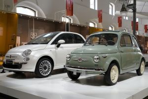 The 2021 Fiat 500 and 1957 Fiat 500 at the ADI Design Museum in Milan, Italy