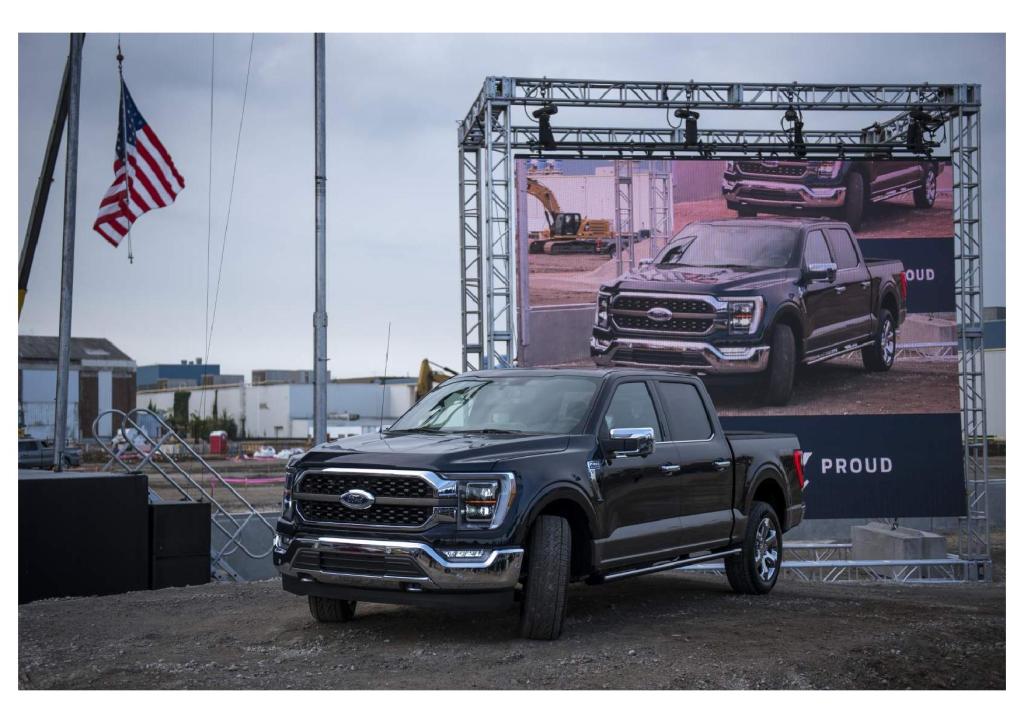 A black 2021 Ford F-150 is displayed at Dearborn plant in Michigan. The 2021 F-150 can get a 700 horsepower supercharger kit for its Coyote V8 engine.