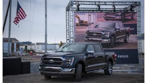 A black 2021 Ford F-150 is displayed at Dearborn plant in Michigan