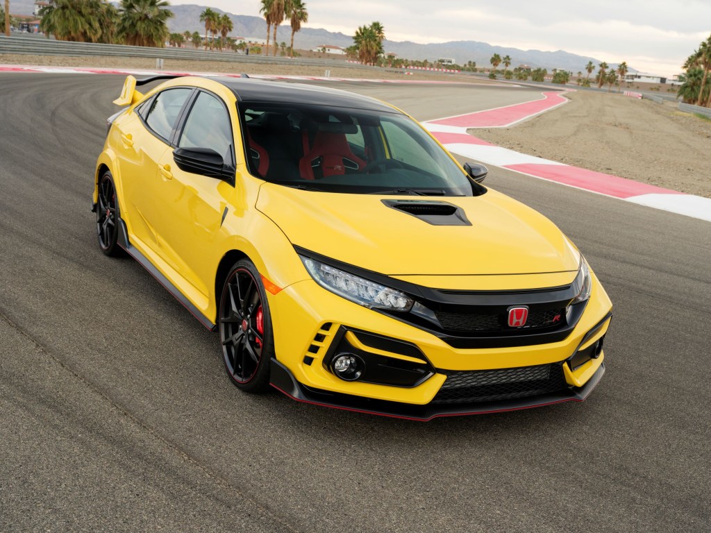 A yellow 2021 Honda Civic Type R Limited Edition on a racetrack