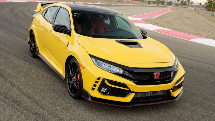 A yellow 2021 Honda Civic Type R Limited Edition on a racetrack