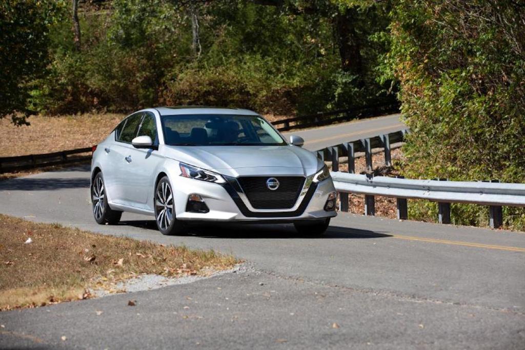 2021 Nissan Altima in silver driving down the road