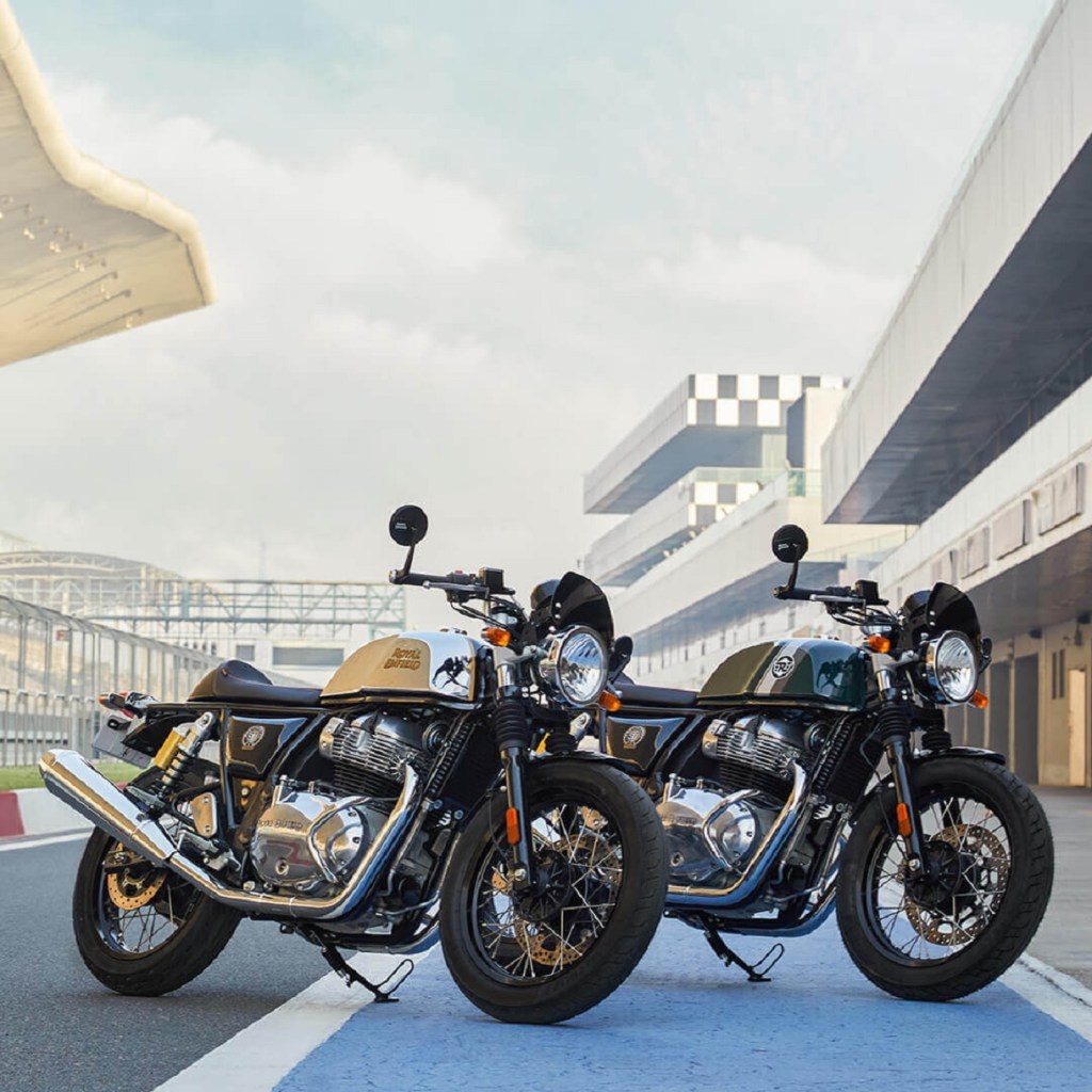 A brown-and-silver and green 2021 Royal Enfield Continental GT 650 on a racetrack