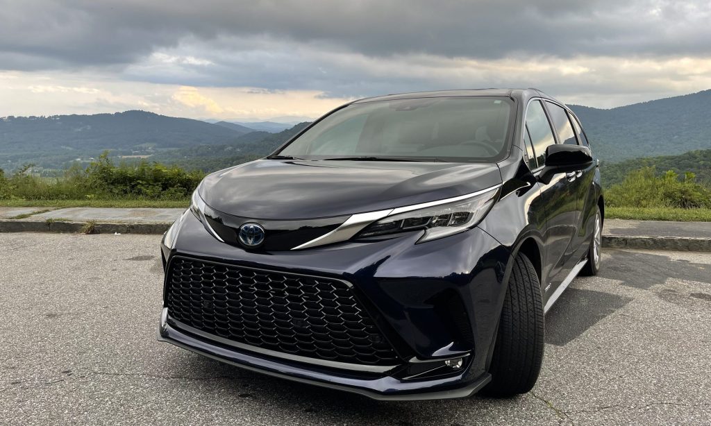 The 2021 Toyota Sienna Hybrid in front of mountain views