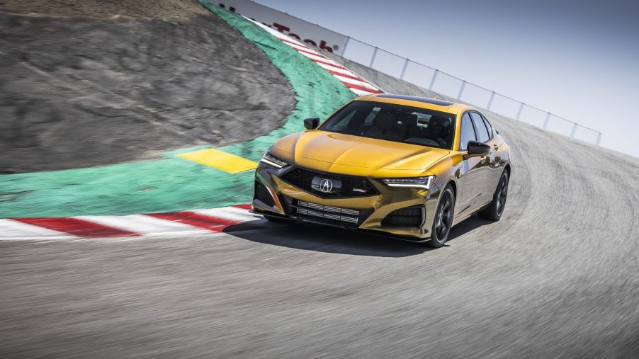A gold 2022 Acura TLX Type S on the track a Laguna Seca