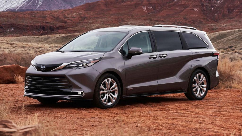 The 2021 Toyota Sienna Hybrid parked in dirt 