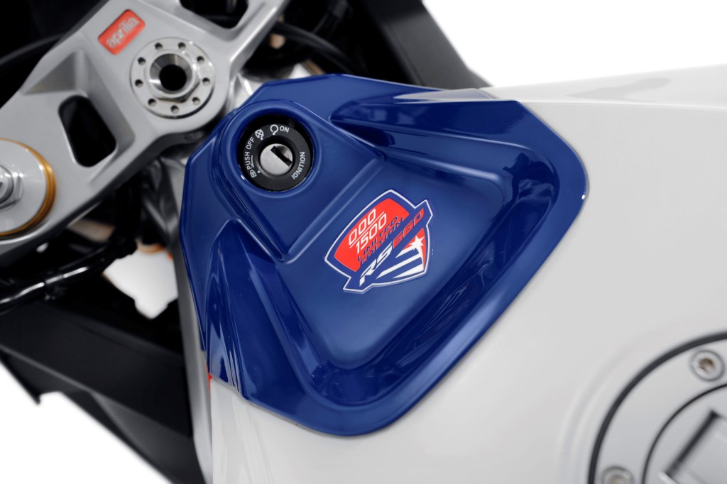A close-up look at the tank decal on the white-blue-and-red 2022 Aprilia RS 660 Limited Edition