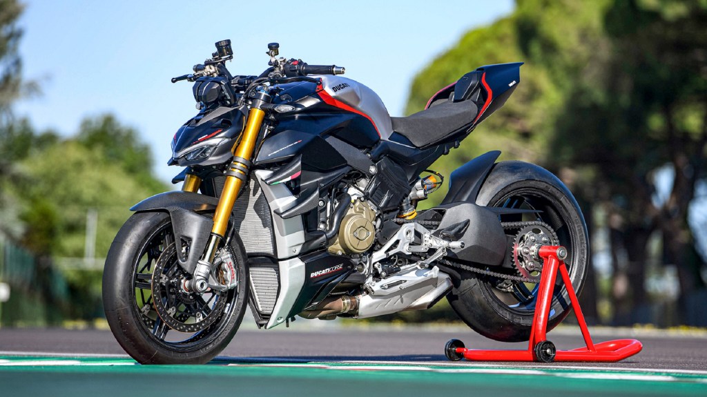 A black-and-gray 2022 Ducati Streetfighter V4 SP on a rear-wheel stand on a racetrack