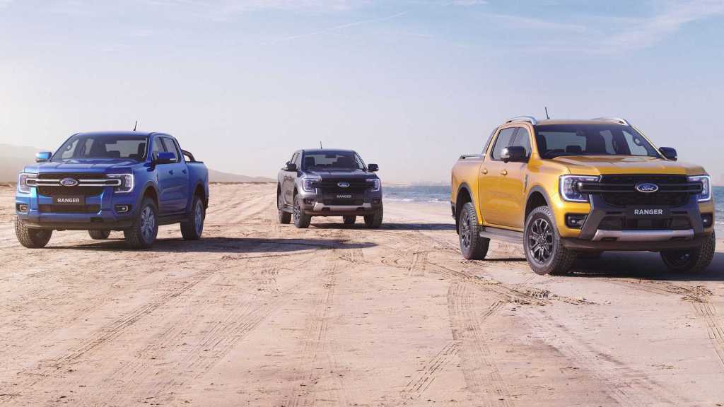 The entire lineup of 2022 Ford Ranger models parked in the desert sand is now on the Consumer Reports recommended pickup truck list.
