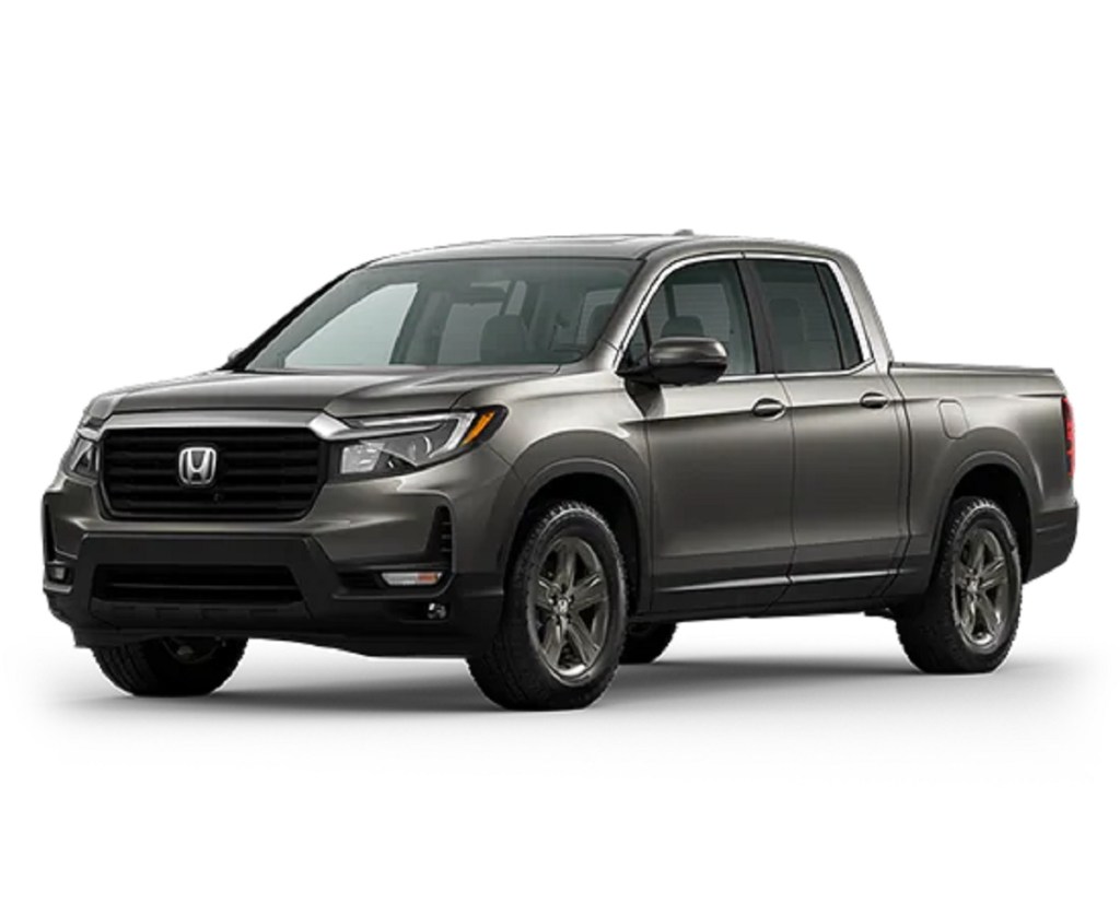 A taupe 2022 Honda Ridgeline against a white background.