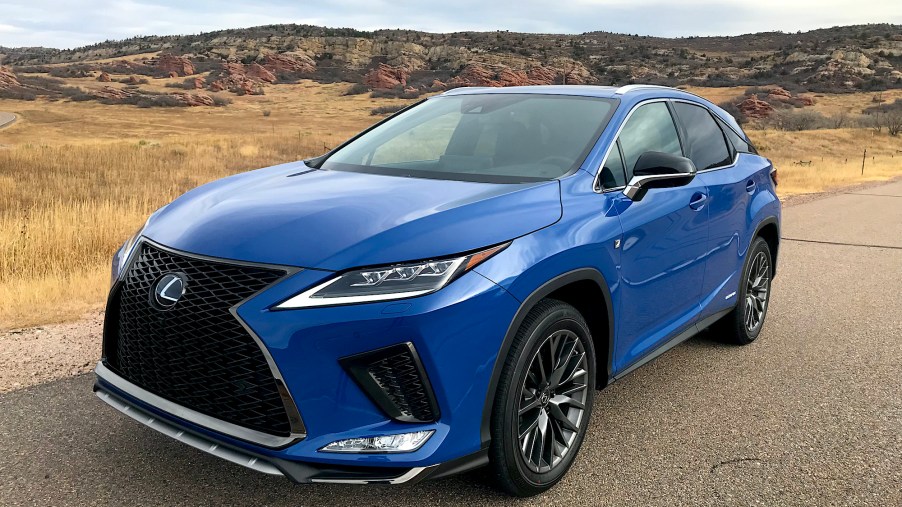 2022 Lexus RX shown in blue on a dirt road