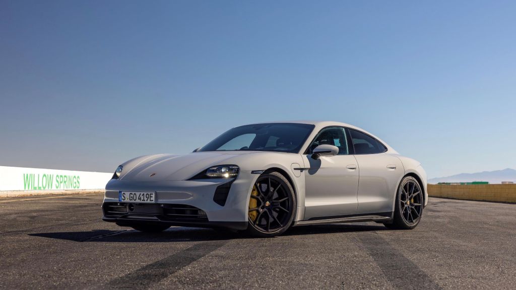A gray 2022 Porsche Taycan GTS at the Willow Springs racetrack