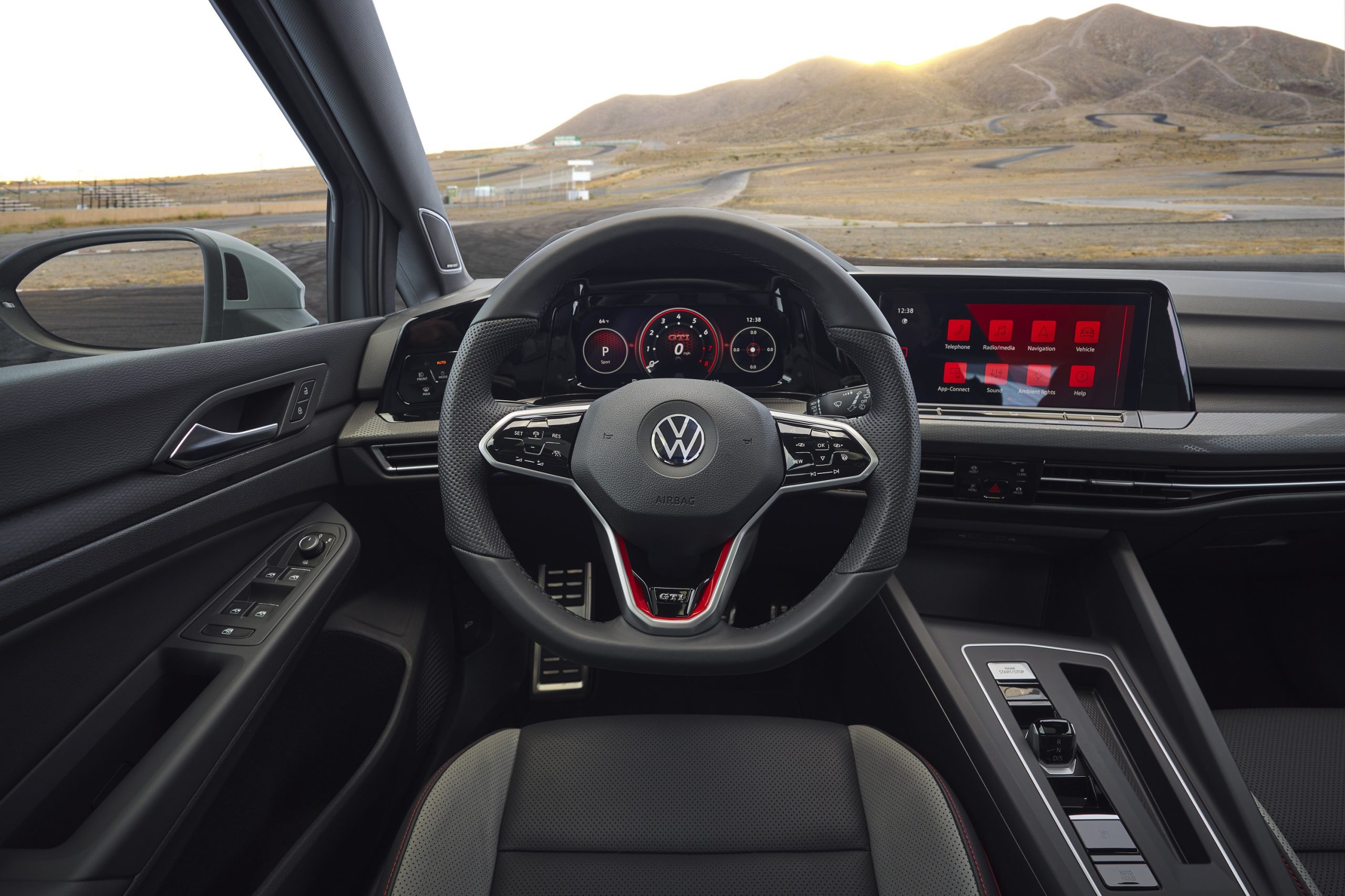 The interior of the new GTI with a new steering wheel and touch-sensitive buttons