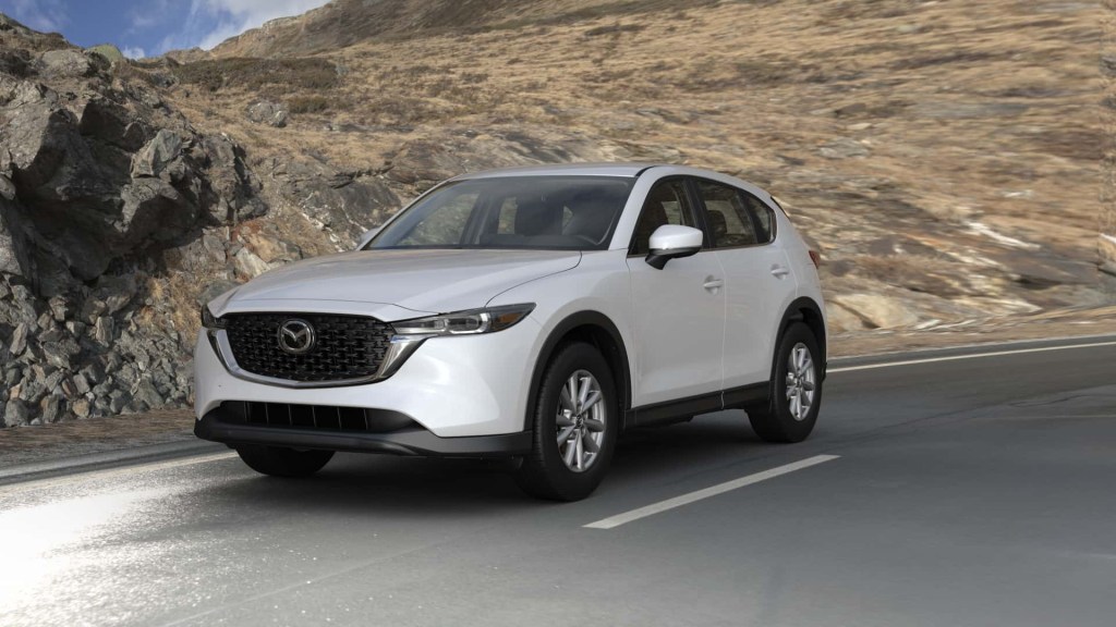 The 2023 Mazda CX-5 driving down the road