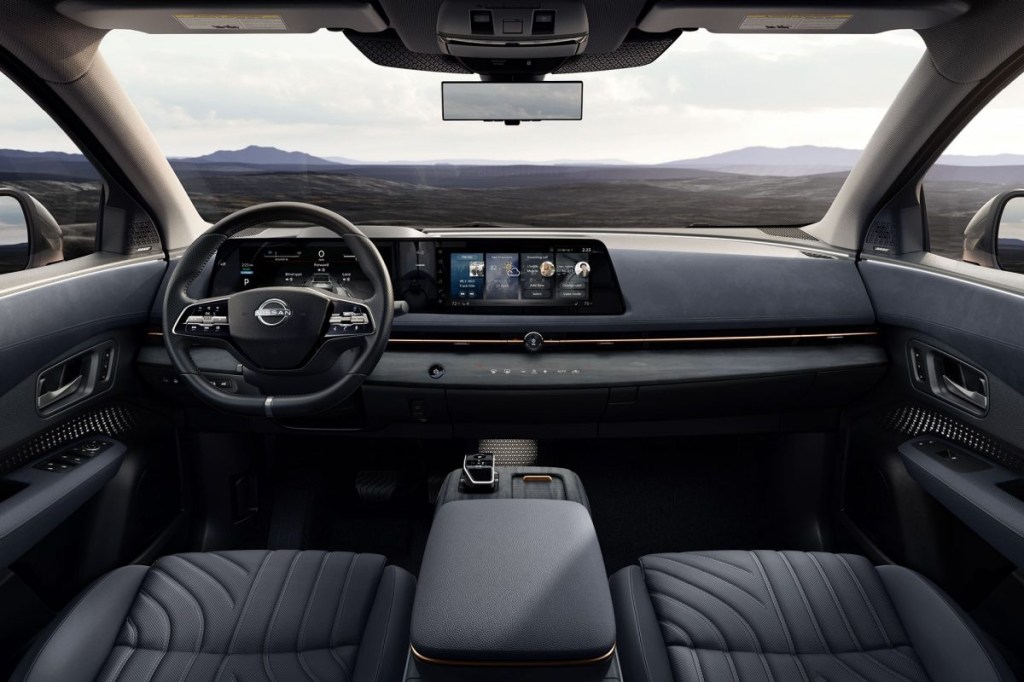 The black interior of a 2023 Nissan Ariya electric crossover, how much does it cost?