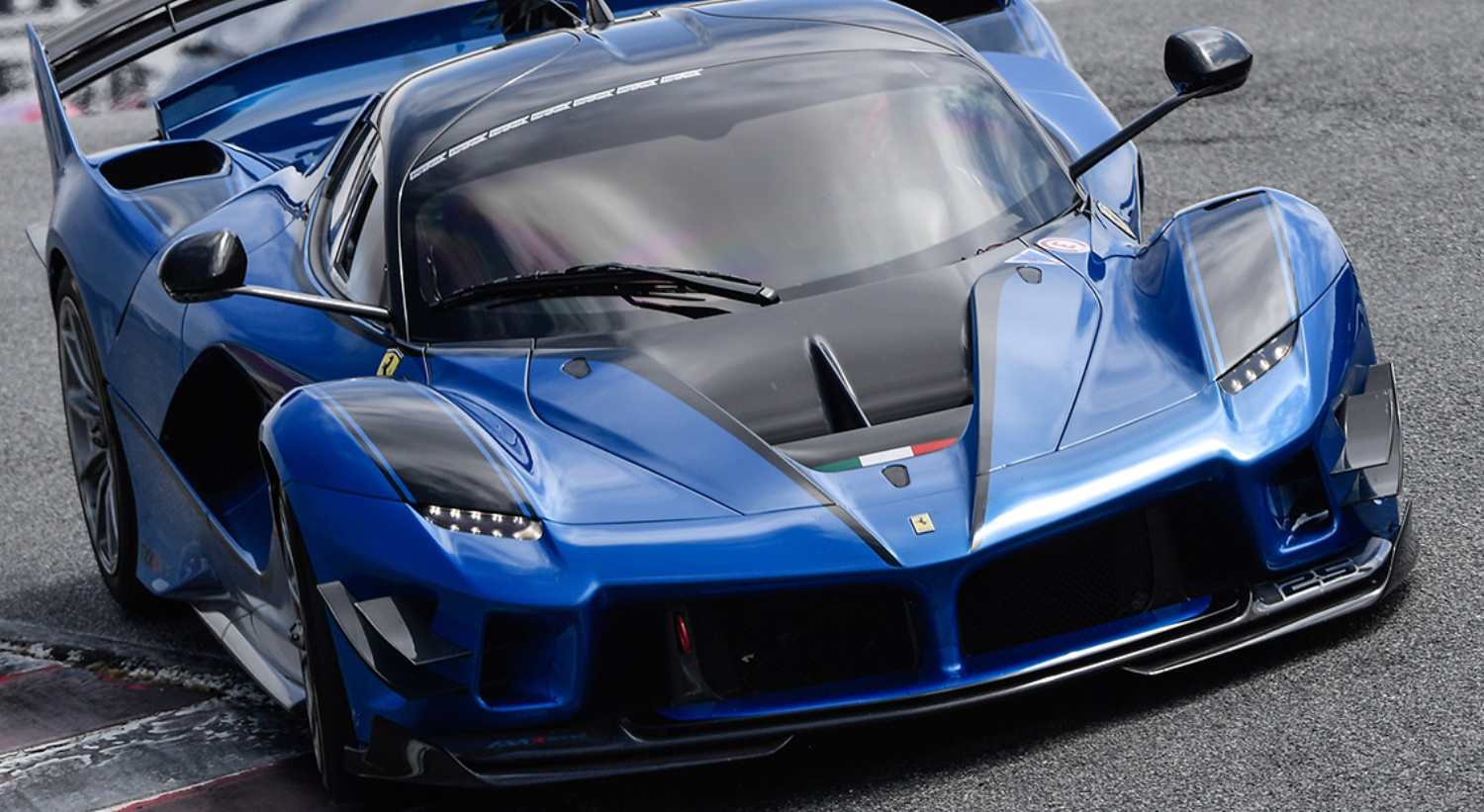 The Ferrari FXX K on the track, which won the case over Mansory