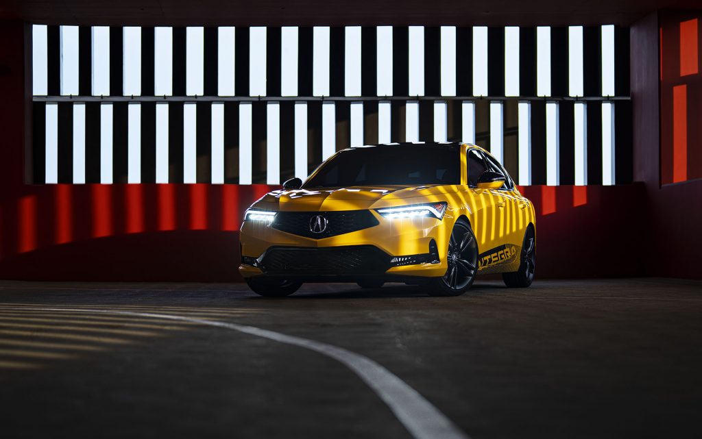 2023 Acura Integra Prototype painted in Indy Yellow Pearl photographed inside a parking garage. This prototype will be the base for the 2023 Acura Integra