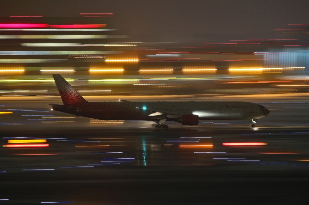 Airplane taking off at night