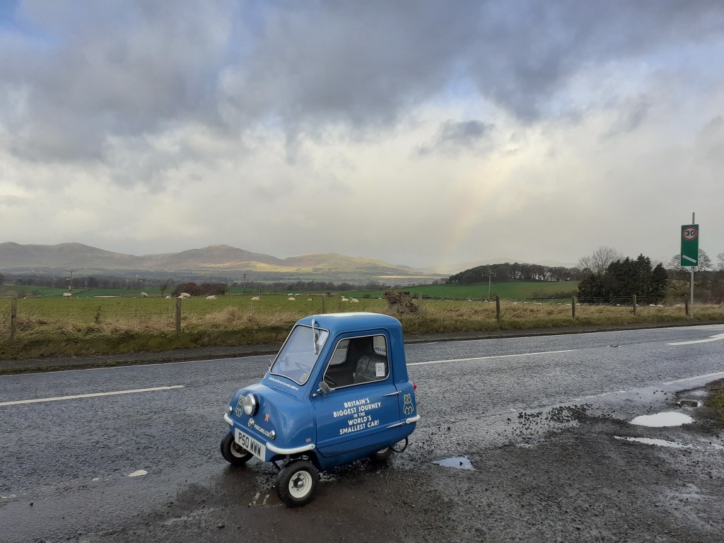 Alex Orchin driving across Britain in the Peel P50, the world's smallest car, to support the Children in Need charity