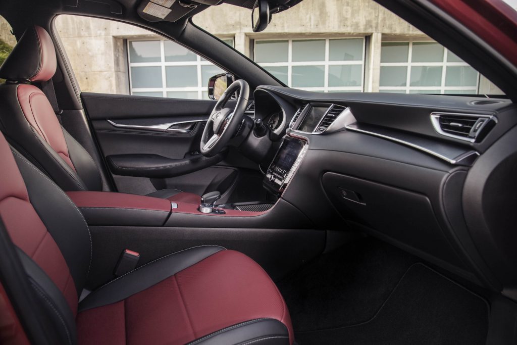 All-new 2022 Infiniti QX55 review interior in red and black. The new luxury SUV is quite stylish and clearly well thought out. 